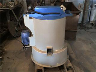 Centrifugadora 50 kg.